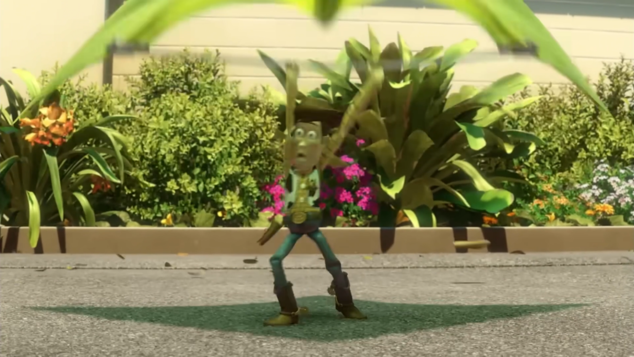 Woody pulled by the paraglider in Toy Story, arms stretching upward while the rest of the silhouette stays still